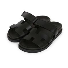 This pair of Cypre Techno sandals are in Black calfskin and feature the iconic H and a velcro crossover strap. Origin: ItalyCondition: New and never wornAccompanied by: Hermes box, dustbags, ribbonSize: 35 EU Black Double Strap Sandals With Rubber Sole, Luxury Slide Sandals With Leather Footbed, Black Leather Slide Footbed Sandals, Luxury Black Calf Leather Slides, Luxury Black Slide Sandals, Black Leather Double Strap Slides, Black Double Strap Footbed Sandals With Leather Sole, Black Leather Sandals With Leather Strap, Black Leather Strap Sandals