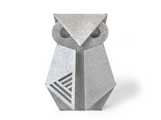 an origami owl sculpture is shown on a white background, it appears to be made out of concrete