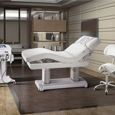 Lovisa 5-Motor Electric Spa & Wellness Table The Lovisa 5-Motor Electric Spa & Wellness Table features a single panel design for maximum customer comfort. The creative 5 motor system allows for maximum mobility, within a concealed design. The table also has a breather hole and massage armrests. The table has been specially designed to carry out full-length treatments making it a perfect fit in wellness and spa environments. This elegant and minimalist-looking table offers a maximum comfo Mobile Spa Truck Spas, Med Spa Design Luxe, Spa Room Ideas Estheticians Luxury, Mobile Spa Truck, Esthetician Table, Medspa Office, Facial Spa Room Ideas, Day Spa Interiors, Wellness Spa Interior Design