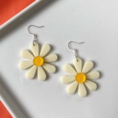 Flower power to the max! These fun, funky oversized flower earrings bring the perfect retro flair to any outfit.  These earrings measure approximately 2.4 inches in length. Each flower is about 1.6 inches in diameter. These earrings feature silver-plated ear wires, so they're great for sensitive ears. Sterling silver is also hypoallergenic and nickel-free.  As if that weren't enough, they're also ultra lightweight, weighing about 4 grams each. Seventies Jewelry, 60s Jewelry, Retro Earrings, Silver Flower Earrings, Retro 60s, Earrings Big, Funky Outfits, Retro Earring, Comme Si