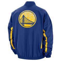 a golden state warriors jacket with the golden gate bridge in the center and yellow accents