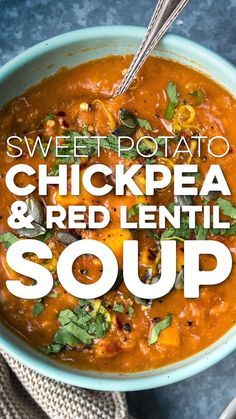 sweet potato chickpea and red lentil soup in a blue bowl with a spoon