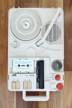 an electronic device sitting on top of a wooden floor