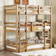 there is a bunk bed with two sets of ladders on the top and bottom