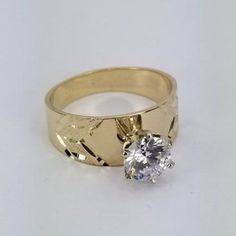 Beautiful engagement ring in 14k gold with a diamond cut zirconia stone design. Ring size is adjustable, please note the size in the personalizing section of checkout. The ring is 1 mm thick. 14k Gold Diamond Ring For Promise With Center Stone, Promise Ring With Brilliant Cut In 14k Gold, Dazzling 14k Gold Solitaire Jewelry, 14k Gold Diamond Ring With Tension Setting, Promise Ring In Yellow Gold With White Topaz, 14k Yellow Gold Wedding Ring With Round Stone, 14k Gold Jewelry With Diamond White Tension Setting, 14k Gold Engraved Ring With Diamond Cut, Dazzling 14k Gold Round Wedding Band