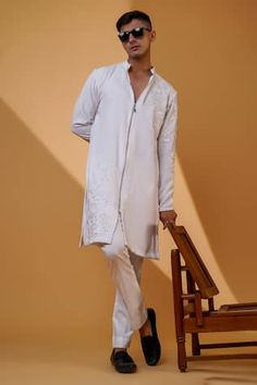 White front short zip kurta with floral pita and dabka work. Paired with a smart fit pant. - Aza Fashions Spring Fitted Dabka Sherwani, Cotton Sherwani With Dabka Work For Spring, Dabka Work, Radhika Madan, Genelia D'souza, Rhea Kapoor, Huma Qureshi, Mira Rajput, Sanya Malhotra