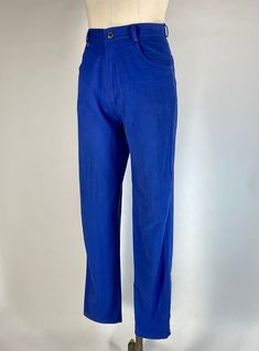 Bear a blue bottom, in these vintage late 80's-90's Mom jean style pants...These denim jean-inspired pants come in a medium weight, blueberry blue, color cotton blend flat weave fabric. They are a high waist fit, with tapered leg silhouette. They feature silver metal hardware with the 'Justin Allen' name, and classic five-pocket design. These pants are in very good condition overall, with some moderate pressed creases (may be semi-permanent, or may come out after time and wear), a fold line at back lower thigh, as well as small area of discoloration to lower left leg near cuff -please see photographs for full details. Labels read 'Justin Allen, size 9/10, made in Bangladesh, 50% cotton/50% polyester, machine wash and dry cool'.Measurements:- 27 inch waist- 38 inch hips- 13 inch rise- 28.5 90s Mom Jeans, Mom Jeans Style, Weave Fabric, High Waist Pants, Mom Jean, Style Pants, Semi Permanent, Waist Pants, Metal Hardware