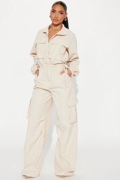 Available In Beige, Olive, And Black. Jumpsuit Long Sleeve Collar Front Zipper Drawstring Cargo Wide Leg Non Stretch Inseam= 34" Self: 100% Nylon Imported | Don't Mention It Windbreaker Jumpsuit in Beige size Medium by Fashion Nova Beige Full-length Casual Cargo Pants, Luxury Beige Wide-leg Cargo Pants, Luxury High-waisted Beige Cargo Pants, High-waist Beige Parachute Pants With Side Pockets, Khaki Military Long Sleeve Jumpsuit, Cargo Jumpsuit, Long Jumpsuits, Jeans Jumpsuit, Matching Dresses