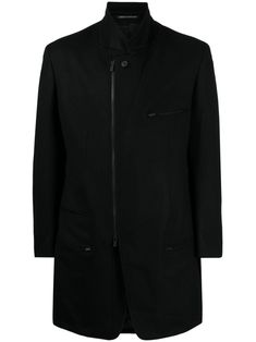 black wool felted stand-up collar notched collar off-centre front zip fastening long sleeves buttoned cuffs zip-fastening chest pocket two side zip-fastening pockets straight hem Black Wool Long Coat With Concealed Front, Black Long Wool Coat With Concealed Fastening, Formal Wool Coat With Stand Collar, Modern Tailored Black Wool Coat, Modern Black Wool Coat With Concealed Placket, Black Tailored Outerwear With Concealed Front Fastening, Black Wool Coat With Stand Collar For Work, Business Wool Coat With Stand Collar, Tailored Black Outerwear With Concealed Front Fastening