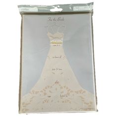 a paper bag with a wedding dress on it