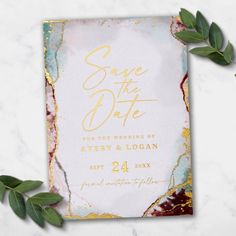 save the date card with gold foil and marble