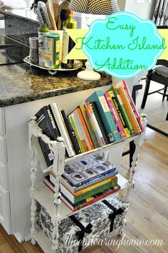 a kitchen island with books on it and a sign that says easy kitchen island addition