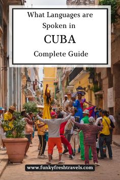 people dancing in the street with text overlay that reads what languages are spoken in cuba complete guide