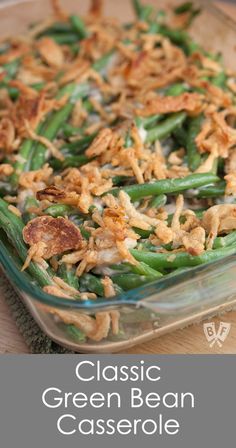 a casserole dish with green beans and crumbs