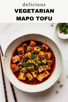 vegetarian mapo tofu in a bowl with chopsticks on the side