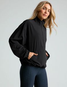 Stretch Woven In Stride Half Zip Pullover | Beyond Yoga Sporty Stretch Activewear With Kangaroo Pocket, Sporty Stretch Top With Kangaroo Pocket, Stretch Athleisure Top With Kangaroo Pocket, Athleisure Stretch Top With Kangaroo Pocket, Athleisure Windbreaker With Pockets For Gym, Sporty Activewear With Kangaroo Pocket For Workout, Sporty Long Sleeve Activewear With Kangaroo Pocket, Athleisure Top With Kangaroo Pocket And Stretch, Sportswear Tops With Pockets For Workout