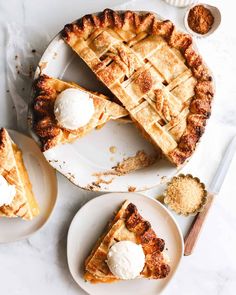 two plates with slices of pie on them and one slice has ice cream in it