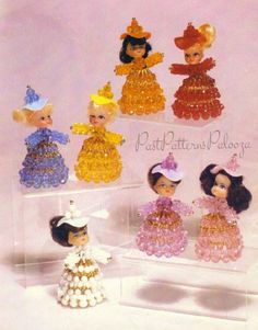 an advertisement for beading with a flair featuring dolls