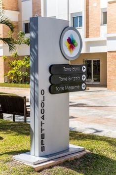 a sign in front of a building that says torre belo and tora spa