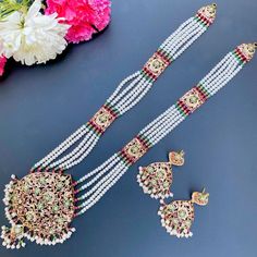 Elegant and evergreen jadau rani haar in 22ct hallmarked gold. The necklace weighs 94.04 GMs including 45.90 GMs in hanging and stringing beads. The earrings weigh 19.71 GMs including 3.48 GMs of hanging beads. 22k Gold Jewelry Necklaces, Stringing Beads, Long Necklace Set, Rani Haar, 22k Gold Jewelry, Hanging Beads, Pearl Necklace Set, Gold Jewelry Necklace, Emerald Necklace