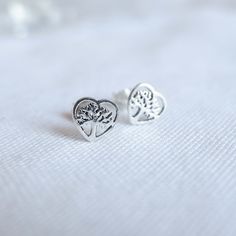 Real 925 Sterling Silver Dainty Tree of Life Heart Stud Earrings These lovely earrings can be used in Earlobe, Tragus and Cartilage. Measures 8mm Comes with pushback backings Sold by Pair Jewelry will come in a gift box * Please read shop policy before placing an order * Paired Jewelry, Gothic Earrings, Heart Stud Earrings, Celtic Jewelry, Lovely Earrings, Heart Studs, Heart Earrings Studs, Stud Earrings Set, Nature Jewelry