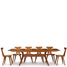 a wooden table with six chairs and one bench in front of the table is shown