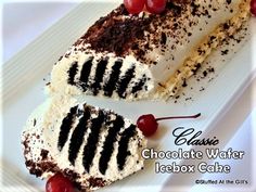 two slices of chocolate water icebox cake with cherries