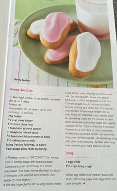 a recipe book with pink and white frosted cookies