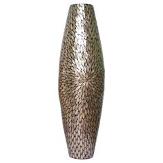 a silver vase with an intricate design on it's side, sitting in front of a white background