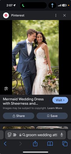 the wedding dress is being displayed on an iphone screen, and it appears to be taken in