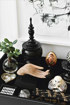 an assortment of decorative items on a tray