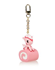 a pink keychain with a little pony on it's back and a chain hanging from the front