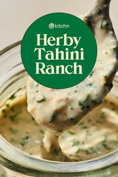 a spoon full of food with the words herby tahini ranch on it