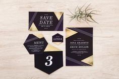 wedding stationery with black and gold geometric design