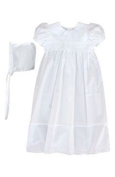 Pretty cotton eyelets make a charming and comfortable christening gown for your little one, styled with puffed cap sleeves and completed with a simple bonnet. Includes matching bonnet Back button closure 100% cotton Hand wash, line dry Imported Kids' Wear Baptism Gown, Christening Gown, Christening Dress, Gowns For Girls, Christening Gowns, White Gowns, Toddler Outfits, Christening, Cotton Dresses