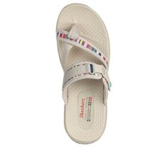 Walk the trails in colorful style and comfort with Skechers Reggae - Baja Sunrise. This strappy toe thong sandal features a multicolor web fabric upper with an adjustable strap. | Skechers Women's Reggae - Baja Sunrise Sandals | Medium Width | Cushioned comfort footbed | Lightweight flexible shock-absorbing Reggae midsole | Crafted with 100% vegan materials | Multicolor web fabric upper | Strappy trail sandal with toe loop | 1-inch heel height | Machine washable | Skechers Adjustable Multicolor Sport Sandals For Summer, Adjustable Multicolor Sport Sandals For Spring, Spring Multicolor Adjustable Sport Sandals, Adjustable Multicolor Synthetic Sport Sandals, Multicolor Synthetic Sandals With Arch Support, Multicolor Sport Sandals With Removable Insole For Beach, Multicolor Cushioned Sport Sandals For Vacation, Multicolor Cushioned Sport Sandals For Beach, Multicolor Synthetic Sport Sandals For Beach