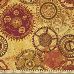 a ruler with gears on it next to a wallpaper pattern in red and gold