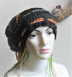 Dreads Long Tube Hat dreadlock Sock Oversized Slouchy Unisex Winter Slouchy Hat Knit Rasta Tam Hippie Boho Headband Dreadstyles Buggy Hat Dreads Woodland Hat Long slouchy beanie. In soft acrylic yarn. Vegan friendly headgear. It's warm and yet suitable to wear all year around.This hat should be suitable for long dreads.Width at brim 22", stretches to 27", cinches smaller with drawstringLength from crown to rim13"Stretches longer or wider if needed. If you need other colours or dimensions please Black Bohemian Knitted Hat, Black Bohemian Crochet Hat, Casual Black Crochet Hat For Festival, Black Hand Knitted Bohemian Hats, Black Hand-knitted Bohemian Hats, Black Bohemian Crochet Hat Hand Knitted, Dreads Long, Reggae Bob Marley, Long Dreads