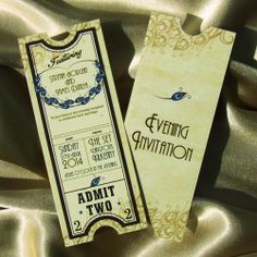 two tickets sitting on top of a satin covered table cloth with the words evening invitation printed on them