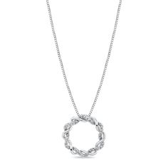 a silver necklace with a circular design on the front and back end, hanging from a chain