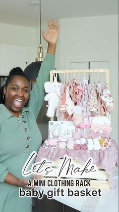 a woman standing in front of a table with baby clothes on it and the words let's make a mini clothing rack for baby gift basket