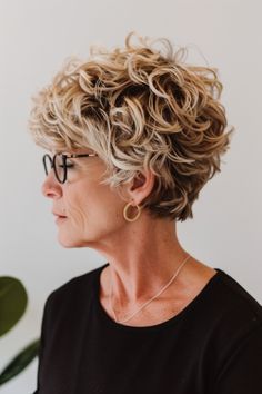 Click for More ➡️ | Save for Later ❤️  Embrace your natural curls with a short pixie cut that enhances texture. It’s a playful style that’s easy to manage and looks great with round glasses. (Curly Pixie - Short Hairstyles For Women Over 50 With Glasses) Hair Cuts For Short Hair Women Curly, Short Hairstyle Women Curly Hair Over 50, Pixie For Thick Wavy Hair, Short Curly Layered Bob, Curling Pixie Hair, Short Layered Curly Haircuts, Short Bobs For Fine Hair, Short Curly Blonde Hair, Bobs Bangs