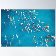 aerial view of boats and surfers in the ocean poster