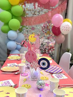 a table set up for a birthday party