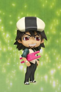 an anime figurine holding a skateboard on top of a green background with sparkles