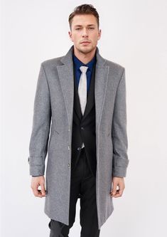 Boost your style in the timeless Light Grey Wool Classic Overcoat. Crafted from luxurious melton wool with attention to detail, this coat is custom-made for a sophisticated and classy vibe. Make an elegant statement with this sleek overcoat. Formal Fitted Wool Coat, Solid Formal Fitted Wool Coat, Formal Fitted Wool Coat In Solid Color, Solid Color Fitted Wool Coat For Formal Occasions, Fitted Solid Wool Coat For Formal Occasions, Elegant Fitted Long Pea Coat, Elegant Tailored Solid Pea Coat, Fitted Timeless Wool Coat For Winter, Elegant Formal Solid Wool Coat