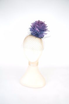 Feathered Flower Fascinator Hat Statement Headpiece A statement cocktail hat, that will certainly make everyone look twice! Purple ombre feathered flower in a deep purple lace base complemented by black veil cascading over the face. The base is 9.5cm diameter and the piece is approximately 10.5cm high.  Secures to the head with an elastic. You are buying the piece you see in the photos. I have tried my utmost to show the colours accurately, however dependent on your monitor settings the colours Whimsical Headpieces For Carnival Party, Kentucky Derby Party Headband Fascinator, Feather Hair Accessories For Summer Evenings, Feather Hair Accessories For Summer Evening, Summer Evening Hair Accessories With Feathers, Whimsical Summer Party Headpieces, Adjustable Hair Accessories For Evening Carnival, Adjustable Evening Hair Accessories For Carnival, Carnival Evening Headband Costume Accessory