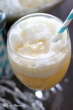 a close up of a drink in a glass on a table