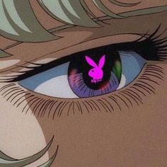 an anime character's blue eyes with pink bunny ears