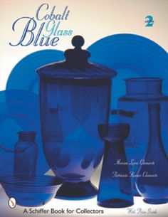 the cover of cobalt glass blue is shown with dishes and vases in front of it